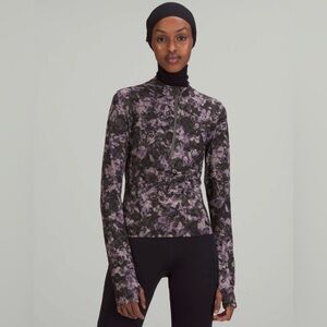 NWT Lululemon Luxtreme Running Half-Zip
Inflect Floral Lunar Rock Multi SIZE 6
